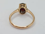 18K YELLOW GOLD RING W/ DARK CENTER STONE (SIZE 5.5) - Idaho Pawn & Gold